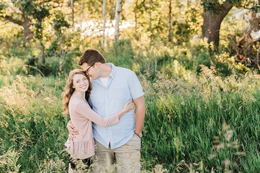 Barn Bluff Engagement Session in Red Wing, MN in grassy field
