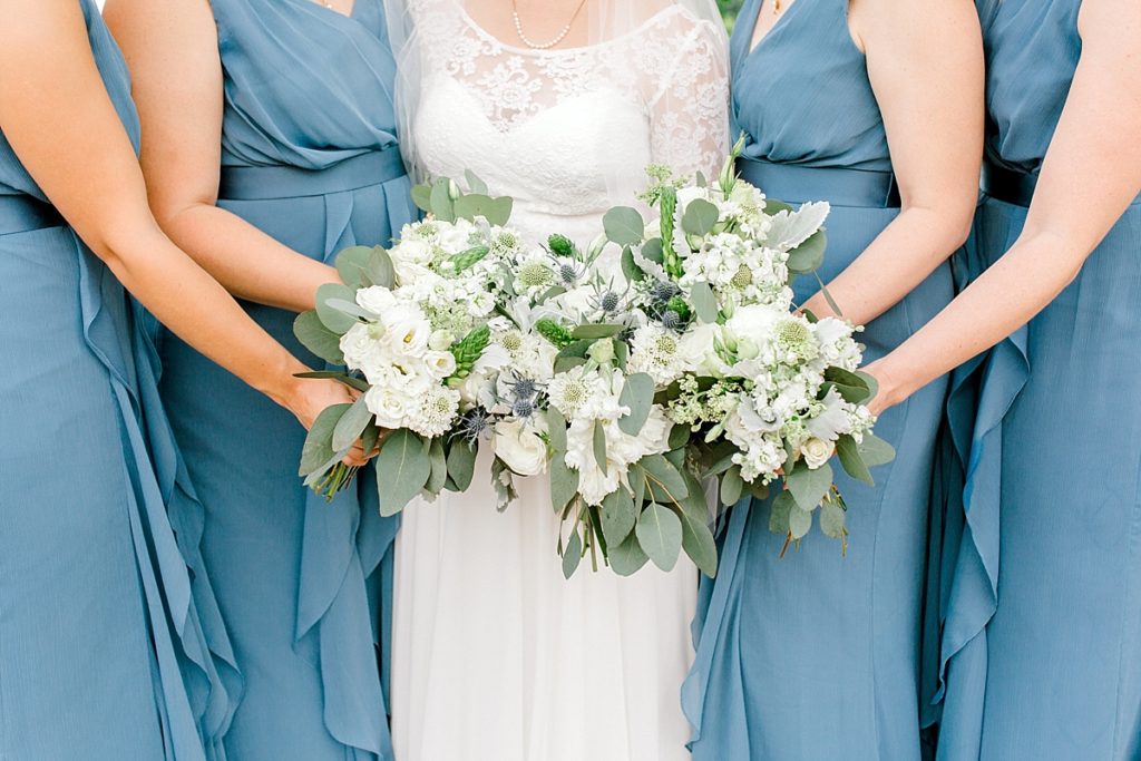 laughing bridal party pictures in steel blue long dresses
