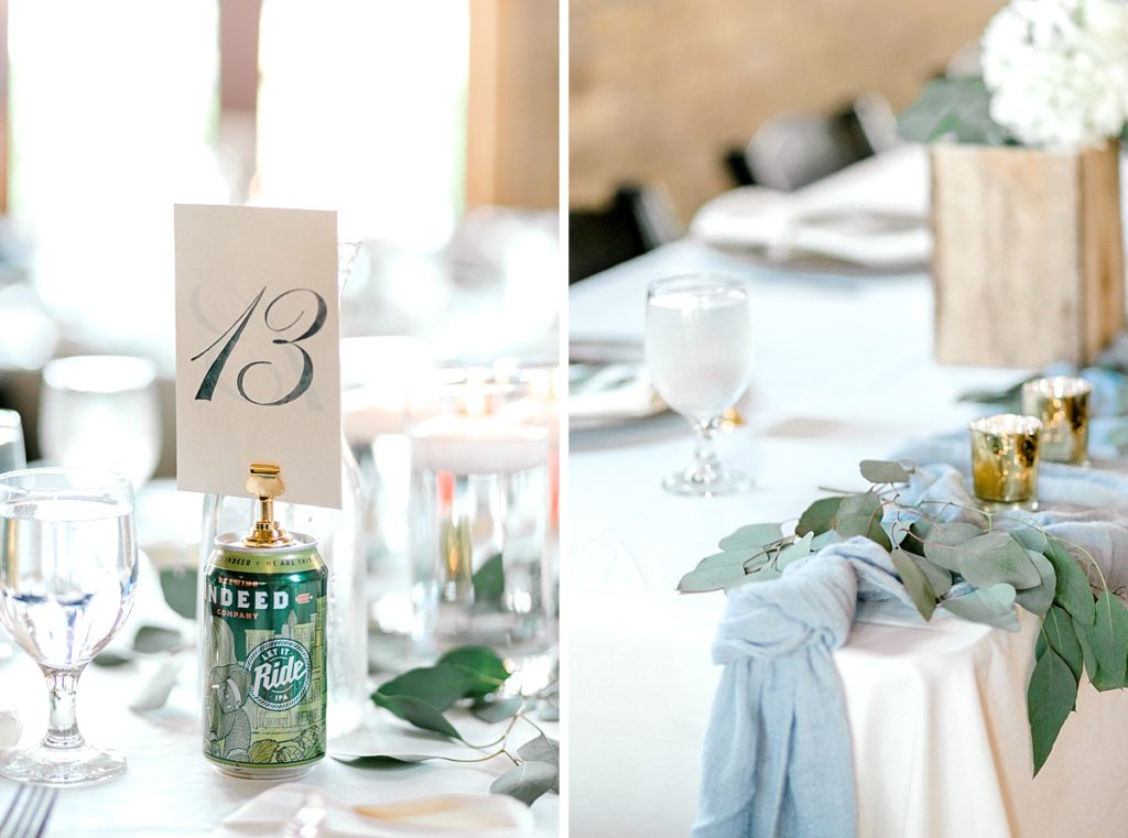 Wedding at Day Block Event Center table settings at loft with beer can table numbers