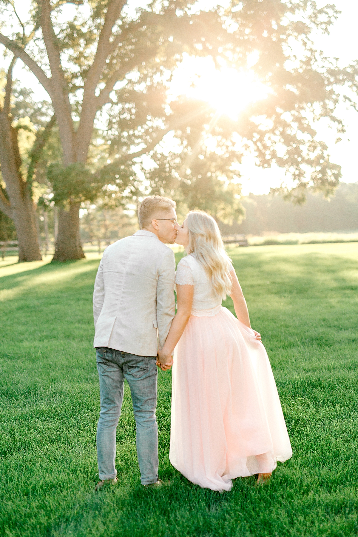 engagement session with glowing sunset backdrop